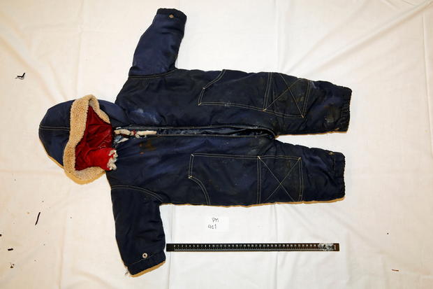 Police handout photo shows belongings of an 18-month old migrant boy Artin Irannezhad 
