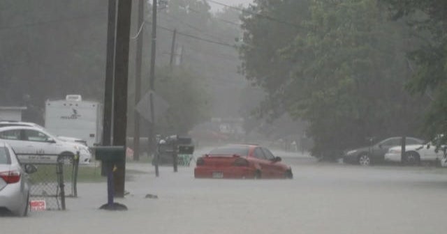 Flash floods swamp South as heat threat persists - CBS News