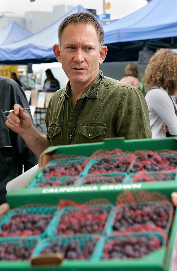 Photo of chef Mark Peel of Campanile shopping for berries at the Santa Monica Farmers Market, Wedne 