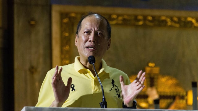 Former president Benigno Aquino III seen speaking to his 