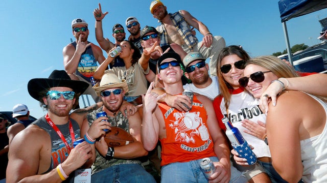 Dad and toddler daughter doing high-five 