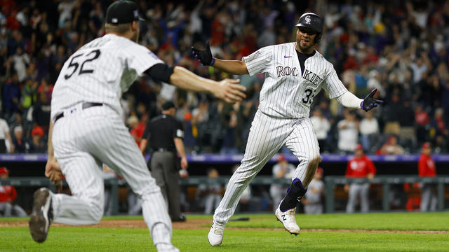 Elias Diaz of the Colorado Rockies celebrates with Brendan Rodgers News  Photo - Getty Images
