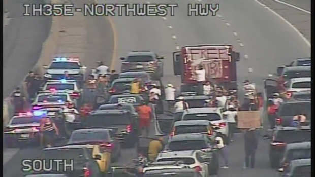 Demonstrators block traffic on I-35E 