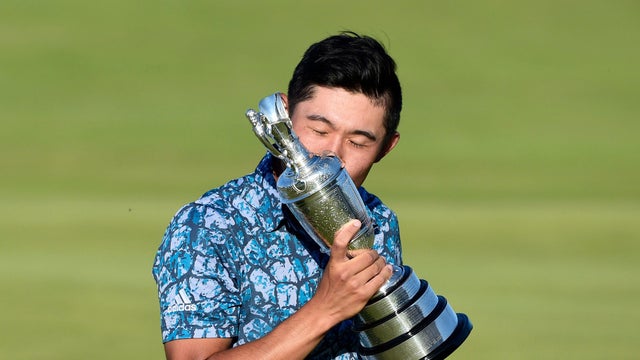 Collin Morikawa of the U.S. celebrates with the Claret Jug after winning the British Open at Royal St. George's in England July 18, 2021. 