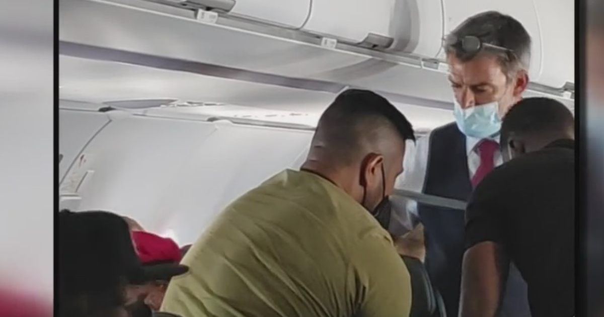 Caught On Camera Teenage Passenger Restrained On Flight From Maui To Los Angeles CBS Boston