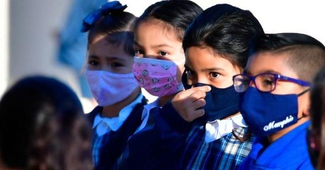 Pediatric COVID infections rise as some school districts impose mask
