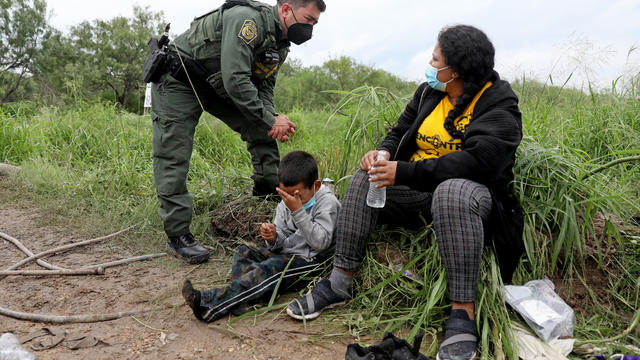 Increased numbers of adult migrants crossing the border illegally, avoiding Border Patrol along the Rio Grande, Texas 