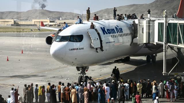 Crowds fleet Taliban at Kabul, Afghanistan, airport 
