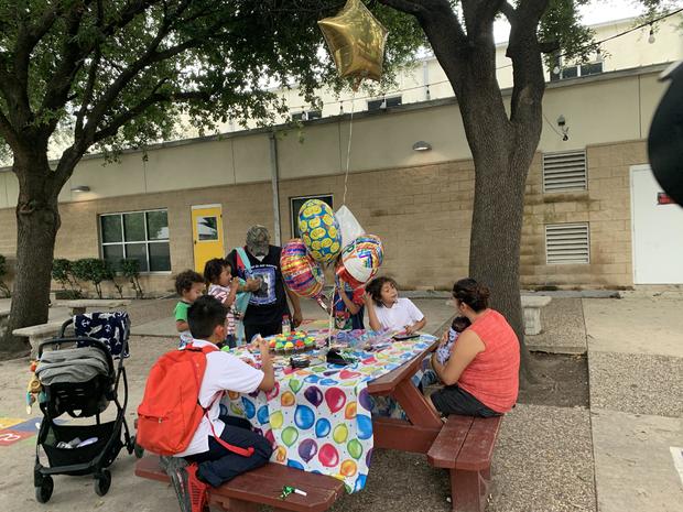 family-birthday-celebration-at-the-salvation-army-shelter-courtyard.jpg 