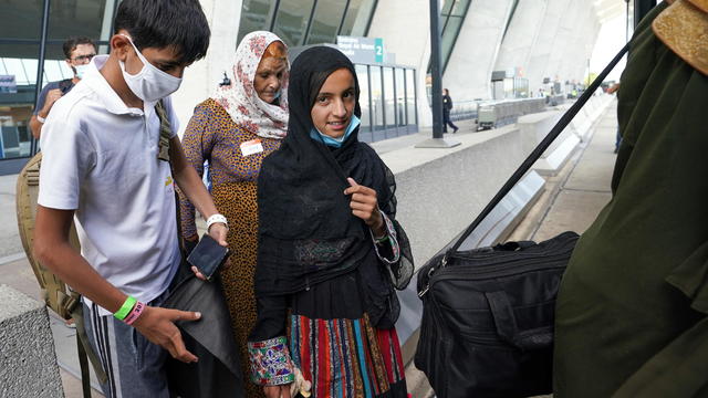 Afghan refugees arrive at Dulles Airport in Virginia 