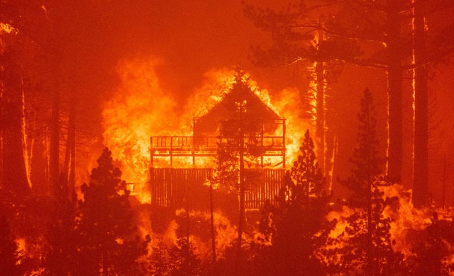 Caldor Fire burning a home near South Lake Tahoe, California 
