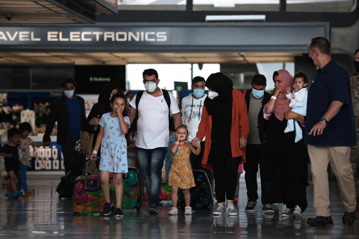 Afghan Refugees Arrive At Dulles Airport After US Pulls Out Final Troops 