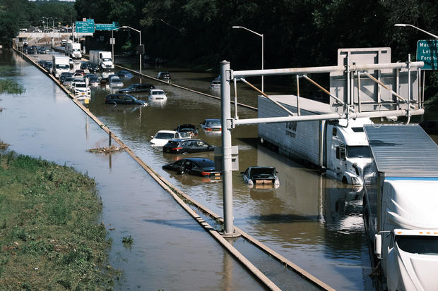 Cars abandoned on flooded highway in New York 