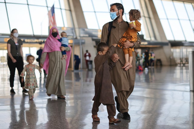 Afghan Refugees Arrive At Dulles Airport Outside Nation's Capital 