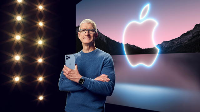 Apple CEO Tim Cook showcases the advanced camera system on the new iPhone 13 Pro 