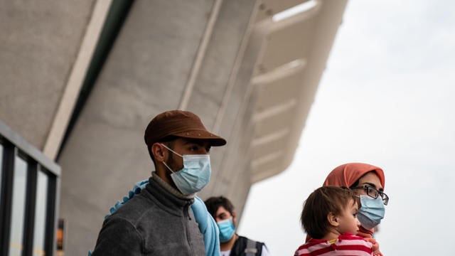 cbsn-fusion-us-bound-afghan-evacuation-flights-temporarily-halted-over-measles-concern-thumbnail-793284-640x360.jpg 