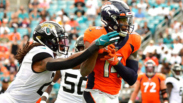 Sutton's career day helps Broncos beat woeful Jaguars 23-13