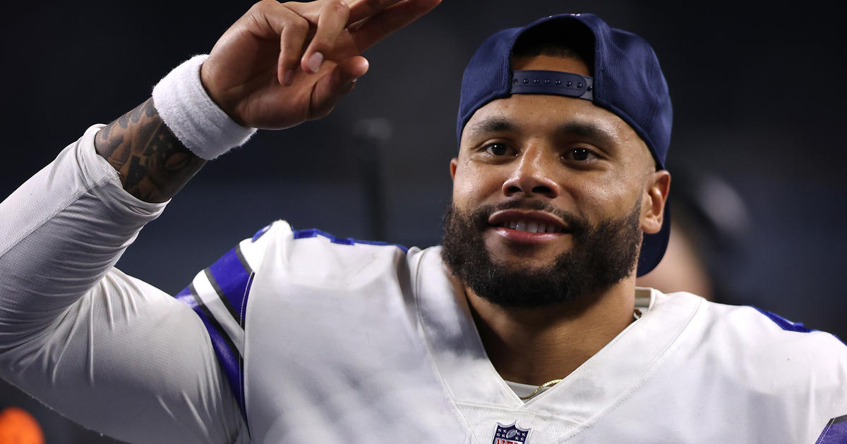 Dallas Cowboys quarterback Dak Prescott (4) in the huddle while on