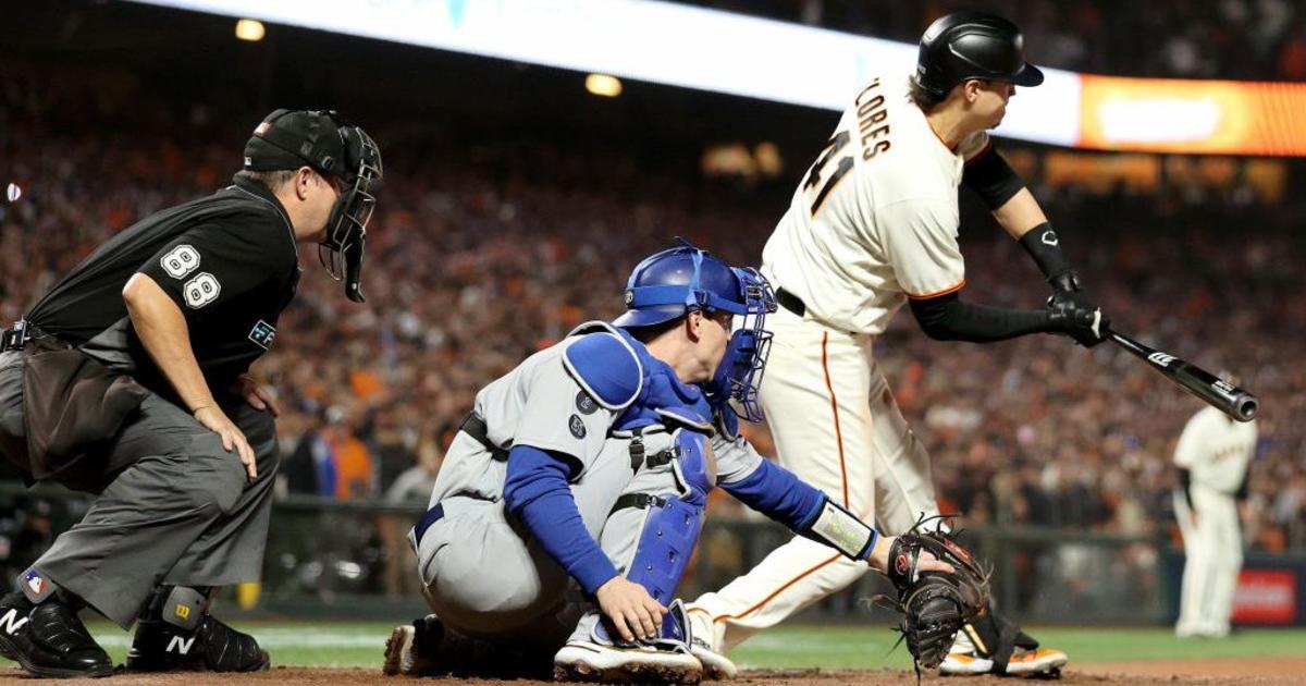 Be inspired by this fan's gigantic Dodger Blue mohawk at NLCS Game