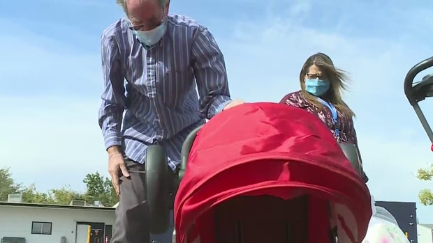 Jon Ursino strollers afghan refugees 