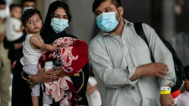 cbsn-fusion-afghan-evacuees-begin-resettlement-in-u-s-thumbnail-821630-640x360.jpg 