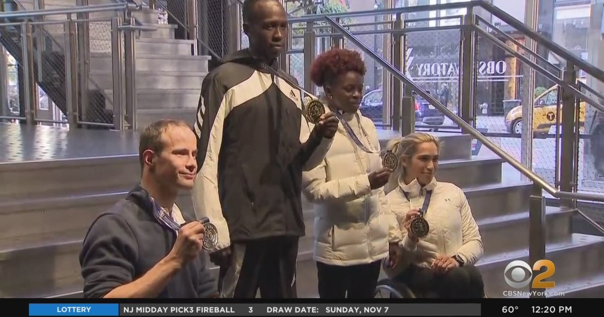 50th New York City Marathon Winners Visit Empire State Building CBS