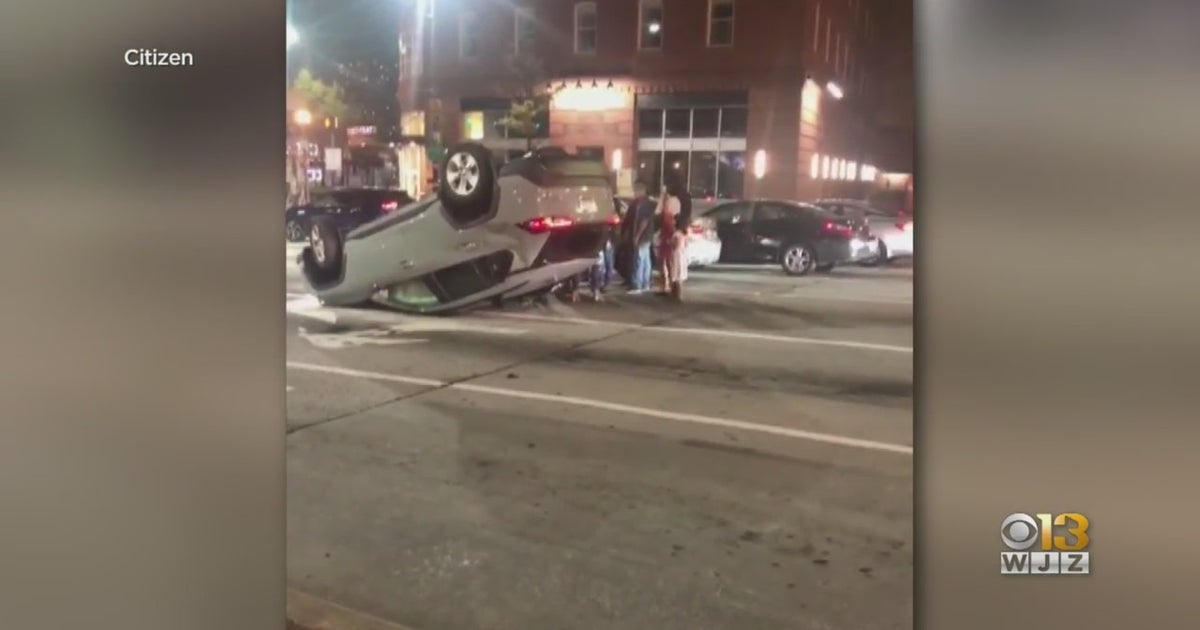Video Captures Squeegee Worker Assisting Driver After Car Overturns