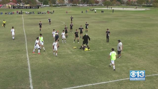 dad-tackles-soccer-ref.jpg 