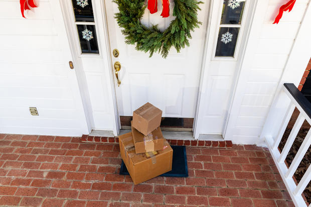 Mail Order packages on front porch during the holiday season 