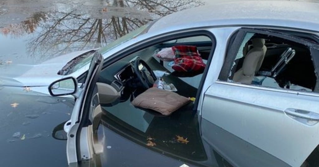 Firefighters Rescue Elderly Woman Whose Car Plunged Into Ayer Pond