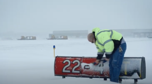 Electricians Clear Runway Signs At MSP 