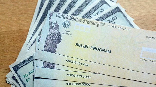 USA dollars background. American rescue plan, USA relief program, stimulus check and Act of 2021 concept. Money, business, profit and livelihood idea 