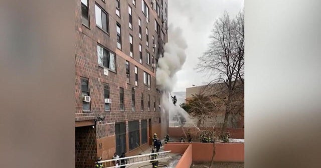 New York City apartment fire kills 19, including nine children, after