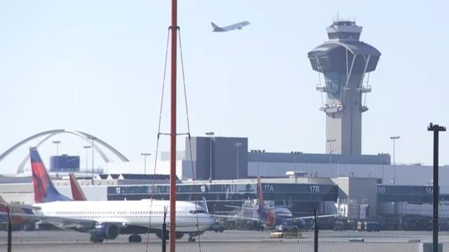 cbsn-fusion-some-us-flights-grounded-amid-north-korea-missile-launch-thumbnail-871570-640x360.jpg 