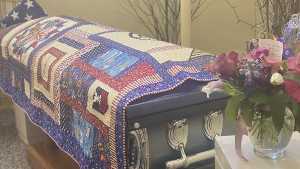 Military Quilt Over Coffin 