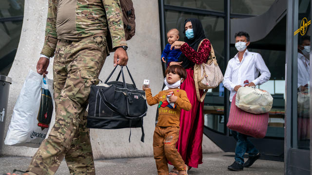 Afghanistan Refugees Arrive at Dulles International Airport 