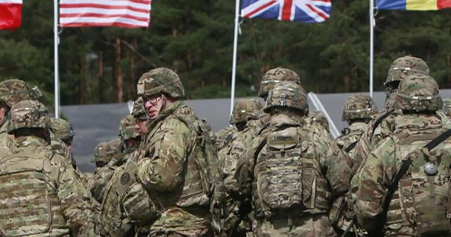 Biden to send troops to Eastern Europe in “near term” - CBS News