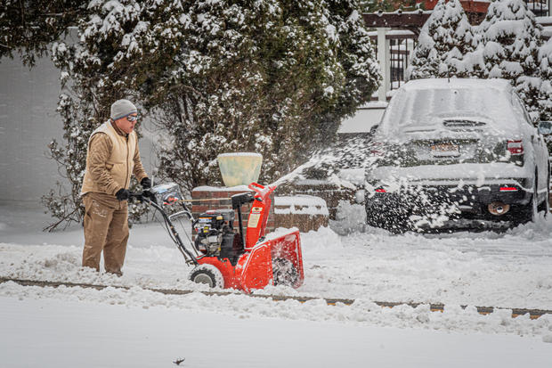 A man seen snow shoveling a driveway. Tappan got blanketed 