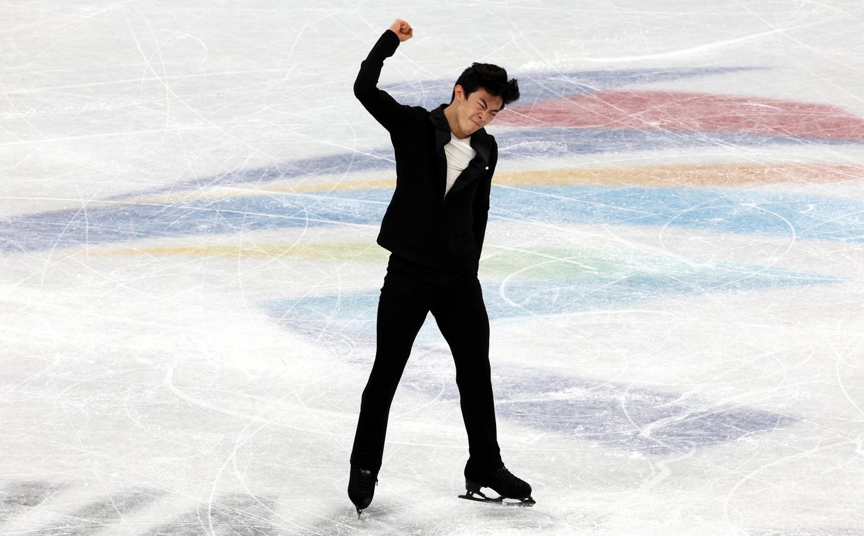 Team USA's Nathan Chen sets figure skating short program world record at Beijing Games CBS News