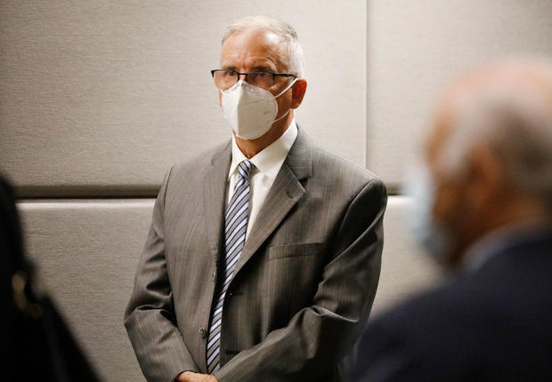 UCLA Gynecologist Dr. James Heaps appears in Los Angeles Superior Court listening as Deputy DA Morgan Mallory, right, addresses the Judge. Heaps was taken into custody after additional charges were filed against him this morning. 