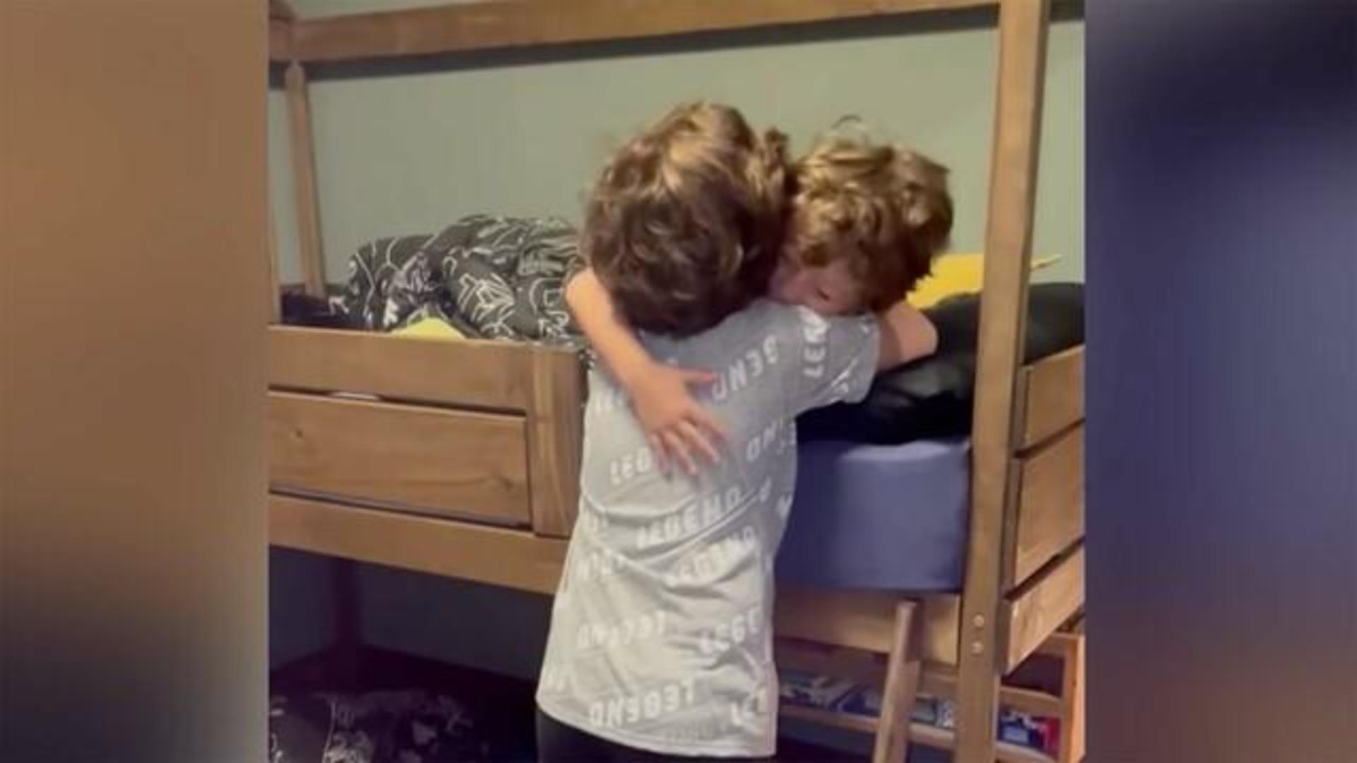 Boy surprises cousin while he is sleeping