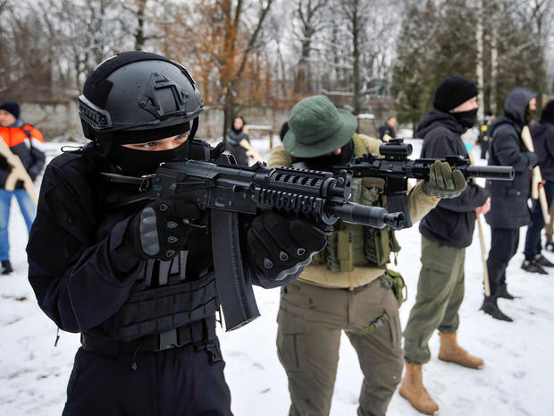 Ukrainians attend an open military training for civilians 