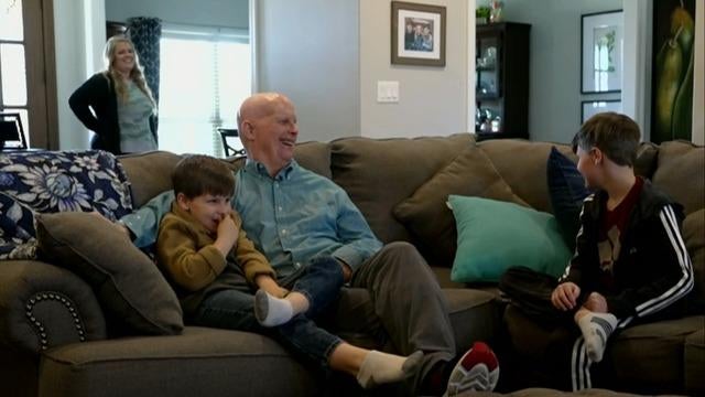 cbsn-fusion-hugagain-lets-grandfather-embrace-grandchildren-thumbnail-913000-640x360.jpg 