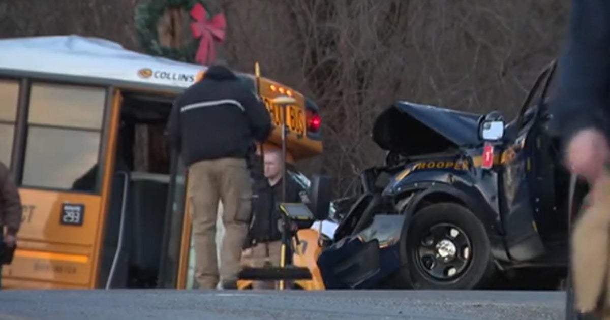 1 killed in collision involving school bus, state police car in
