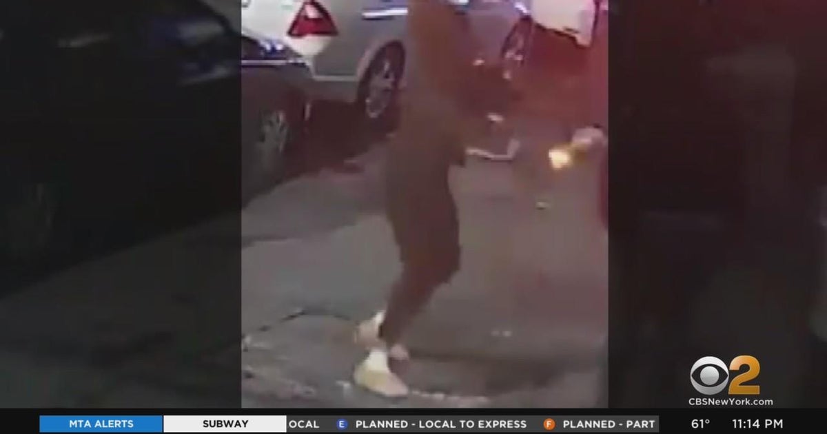 Surveillance video shows shooting at Queens bar that injured 2 CBS