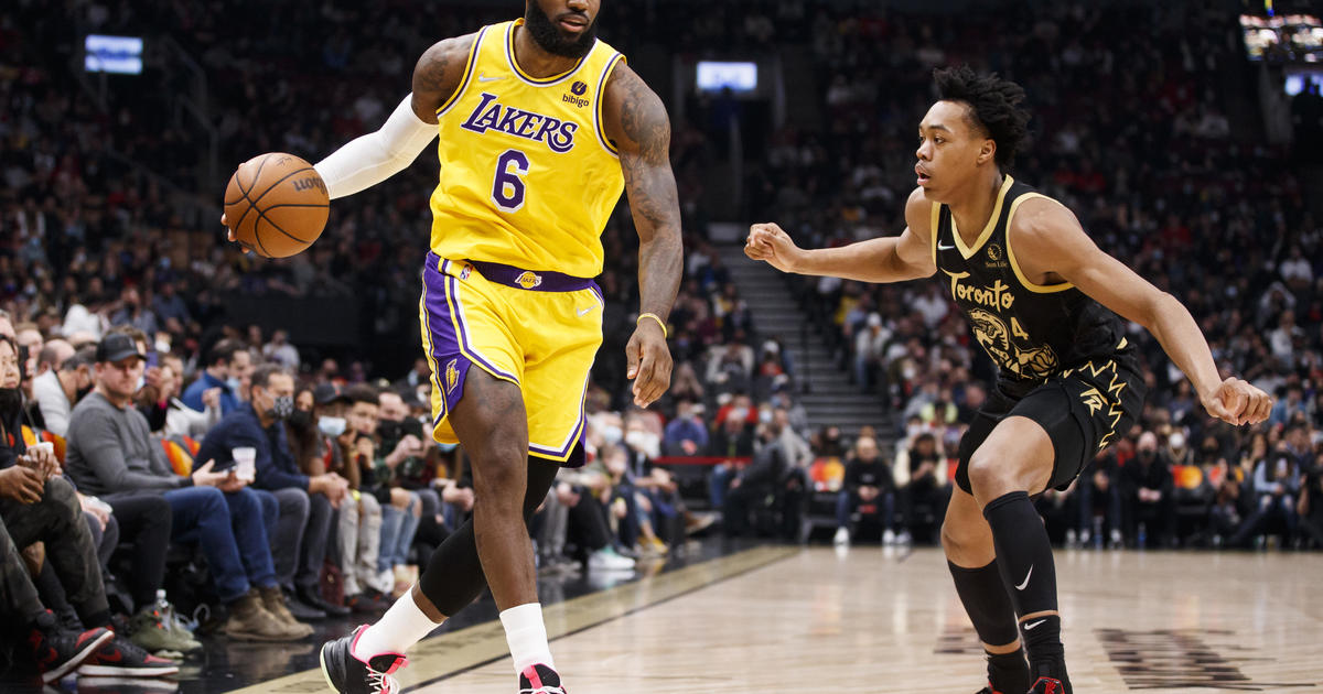 James scores 35 Lakers beat Raptors in OT 128 123 snapping 3