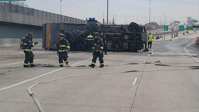 trash-truck-flipped-from-denver-fire1.jpg 