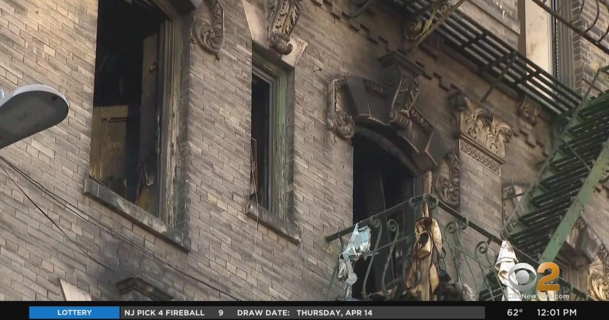 Woman, adult son killed in Chinatown apartment fire - CBS New York