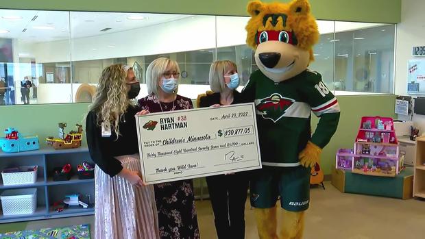 Nordy delivers check to Children's Minnesota 