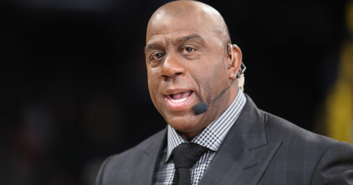 Group including Magic Johnson reaches proposed deal to buy NFL's
